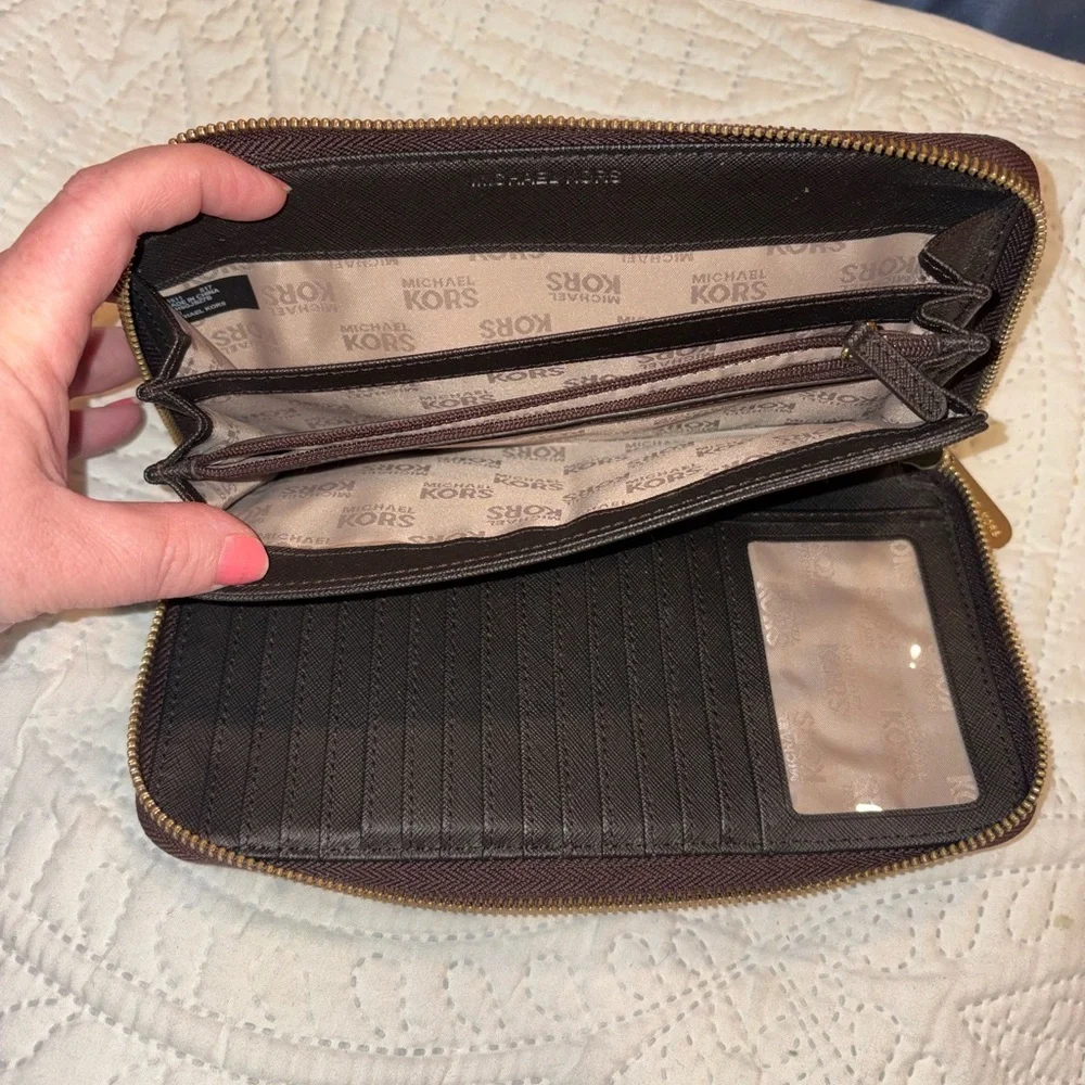 Michael Kors Jet Set Travel continental zip-around wallet in the signature brown